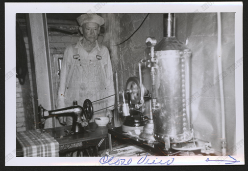 Harry W. McGee, Milwaukee, WI, ca: 1960, Photograph 1886 Sewing Machine Powered by Steam Engine 1, Nichols Collection, Front 