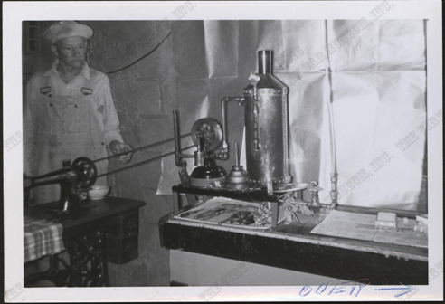 Harry W. McGee, Milwaukee, WI, ca: 1960, Photograph 1886 Sewing Machine Powered by Steam Engine 2, Nichols Collection, Front